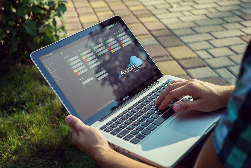 AxiomCLOUD access management software open on a laptop